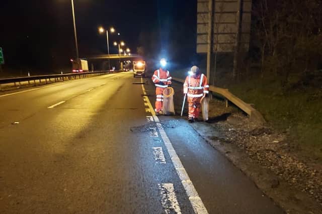 Picking up litter along the A14 between Junctions 9 and 10 of the A14 at Kettering