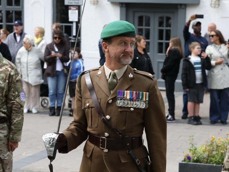 Kettering town centre: crowds line town centre to welcome The Royal Anglian Regiment for Armed Forces Day parade /National World