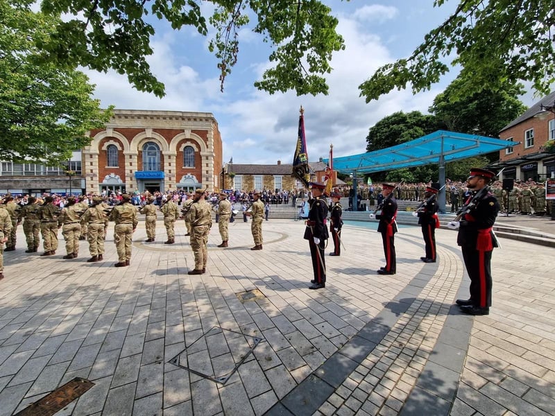Kettering town centre: crowds line town centre to welcome The Royal Anglian Regiment for Armed Forces Day parade /National World
