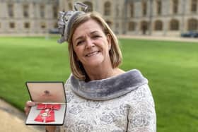 Tracy Whittaker-Smith was awarded with the MBE by Prince William for her decades of service to trampolining.
