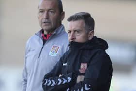 Cobblers boss Jon Brady is keeping his fingers crossed the injuries to Shaun McWilliams and Tyler Magloire are not serious (Picture: Pete Norton)