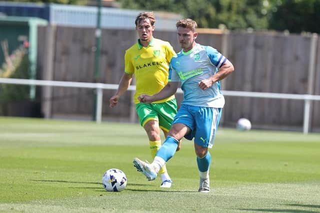 Cobblers captain Sam Hoskins on the ball against Norwich