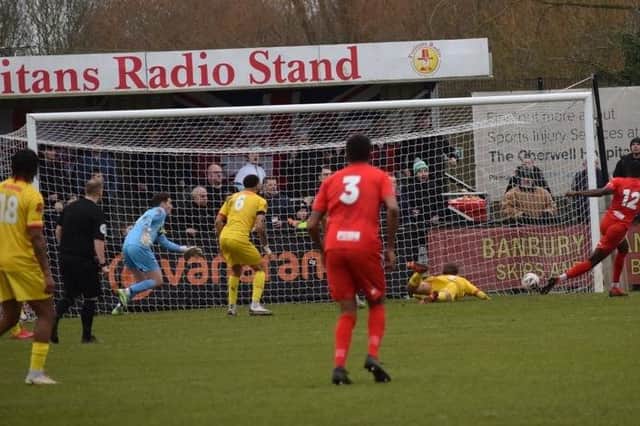 Levi Amantchi scores the only goal of the game as Brackley Town won 1-0 at local rivals Banbury United on New Year's Day. Picture by Julie Hawkins