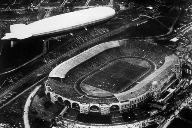 April 1930:  An aerial view of the Graf Zeppelin flying over Wembley Stadium in London during the 1930 FA Cup Final.  (Photo by Central Press/Getty Images)