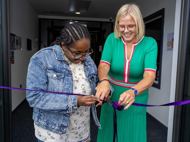 Mirah Mshudulu officially opened the building by cutting the ribbon and unveiling the plaque.
