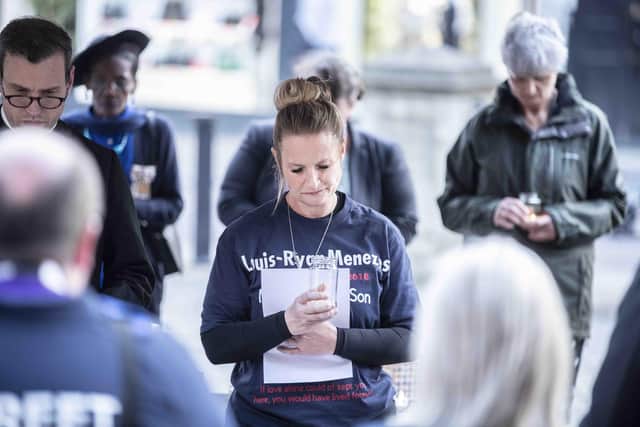 Cheri during the two-minute silence, to remember the knife crime victims during the candlelit vigil. Photo: Kirsty Edmonds.