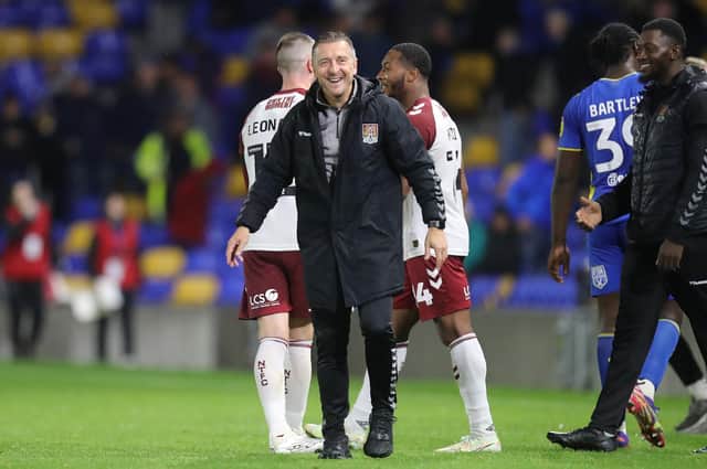 Cobblers boss Jon Brady was a very happy man after the Cobblers' win at AFC Wimbledon on Tuesday