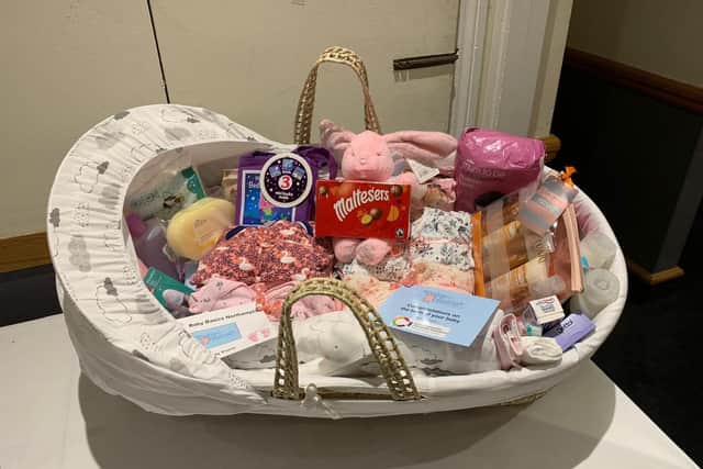 A Baby Basics starter pack for the mother of a baby girl.