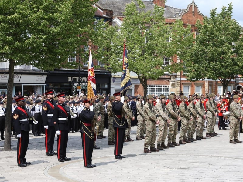 Kettering town centre: crowds line town centre to welcome The Royal Anglian Regiment for Armed Forces Day parade /National World