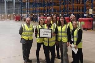 UKWA CEO Clare Bottle (3rd from Right) with the Unipart Logistics team.