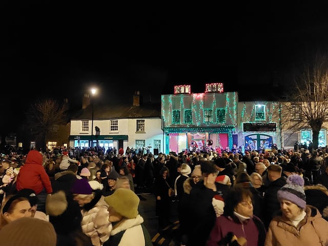 Earls Barton celebrates Christmas Eve in the Square - Attendees wrapped up warm to brave the elements