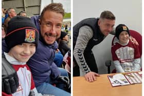 Jesse Mansfield with dad Dave (left) and Cobblers boss Jon Brady (right) at the Walsall game on February 4