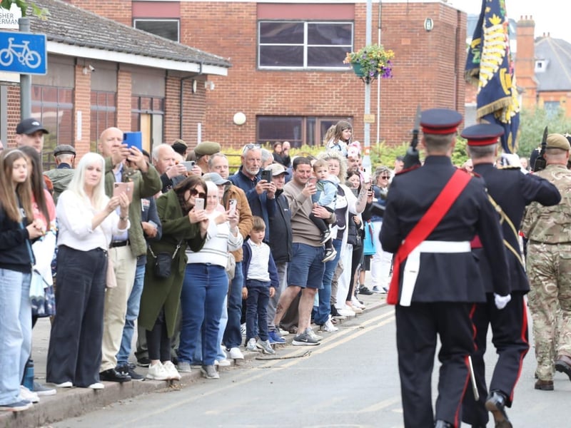 Kettering town centre: crowds line town centre to welcome The Royal Anglian Regiment for Armed Forces Day parade /National World