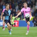 Dean Campbell gets a pass away for the Cobblers at Wycombe (Picture: Pete Norton)