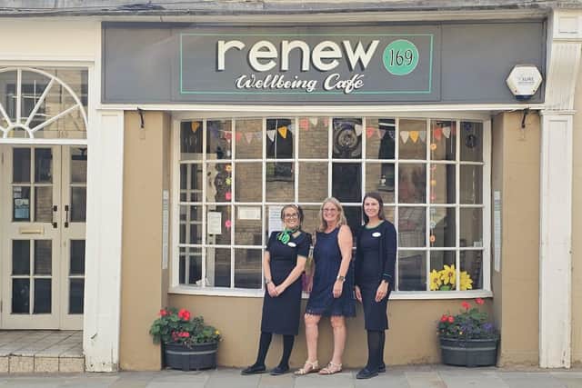 Specsavers Towcester colleagues meet with the cafe manager