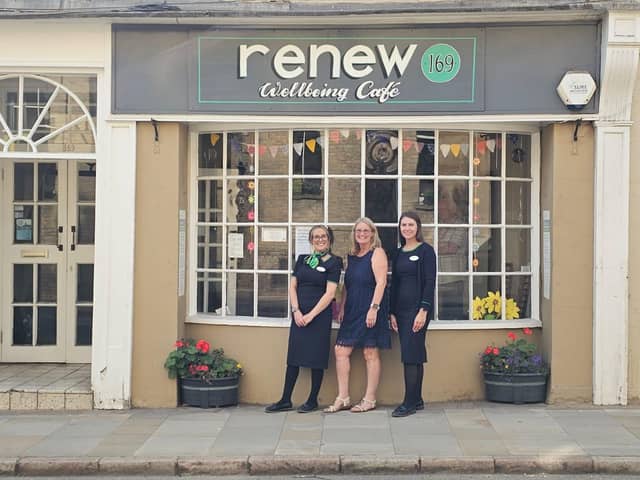 Specsavers Towcester colleagues meet with the cafe manager