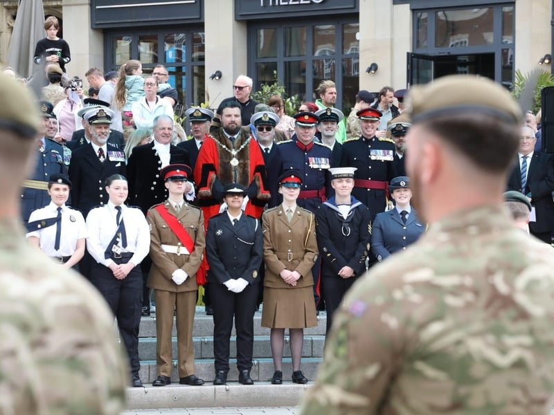 Kettering town centre: crowds line town centre to welcome The Royal Anglian Regiment for Armed Forces Day parade /National World