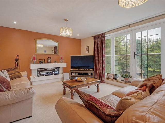 Here is another one of the five reception rooms in this large seven-bedroom home.