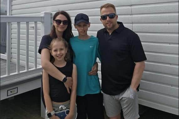 Darren and Miranda Eales with their children Kit (middle) and Lottie