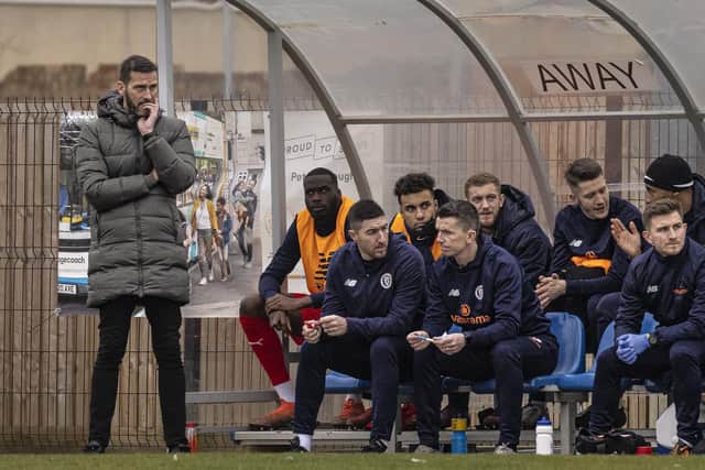 Brackley Town boss Roger Johnson watches his side lose 2-0 at Peterborough Sports on Saturday (Picture: Glenn Alcock)