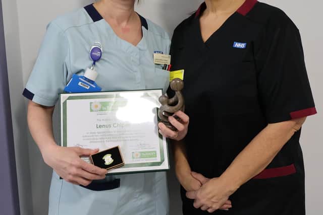 Student Nurse Lenus Chiper presented with her award by Director of Nursing Jo Smith.