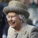 Queen Elizabeth II smiles as she arrives before the Opening of the Flanders' Fields Memorial Garden at Wellington Barracks on November 6, 2014 in London. Photo by Stefan Wermuth - WPA Pool /Getty Images