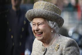 Queen Elizabeth II smiles as she arrives before the Opening of the Flanders' Fields Memorial Garden at Wellington Barracks on November 6, 2014 in London. Photo by Stefan Wermuth - WPA Pool /Getty Images