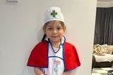 Olivia aged 5 was asked to dress as someone inspiring, so she dressed as a nurse as she wants to help people when she is older.