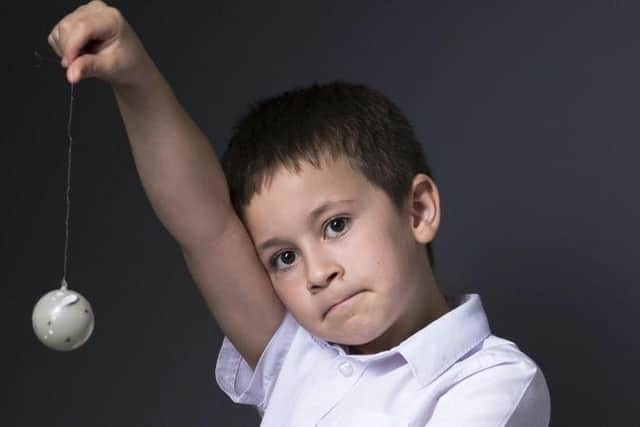 Aston Smith, a 10-year-old autistic author and space fanatic.