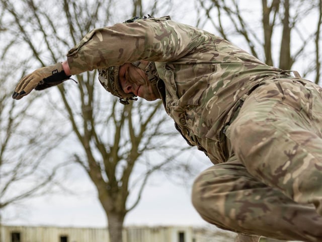 Caption/Description: Image: Sgt Hemmings from 2nd Battalion The Royal Anglian Regiment leaps over the 4ft wall obstacle of the Confidence Course in Copehill Down. The Infantry soldiers tackled the course as part of their build up training ahead of their deployment onto Exercise Wessex Storm.