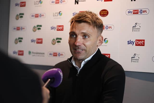 Chris Hogg speaks to the media
