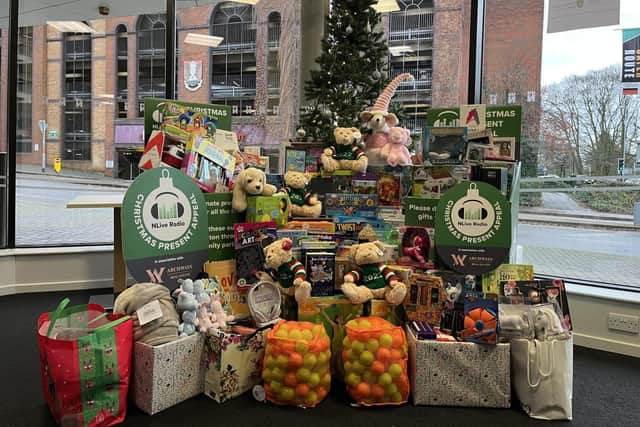 Christmas presents around the NLive Radio Christmas Tree