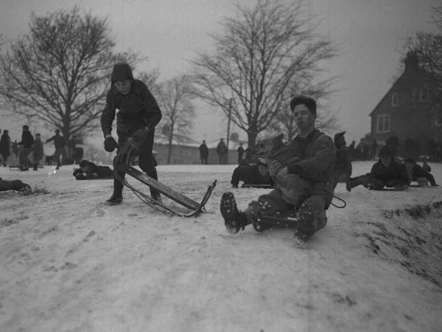 Early 1960s, sledges in the snow