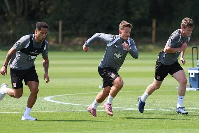 Elliott List, Sam Hoskins and James Maxwell in action at St George's Park on Monday. Picture: Pete Norton