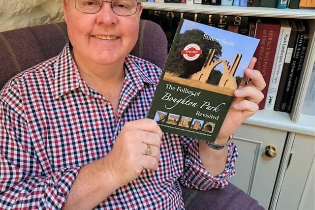 Simon Scott with his book on the follies of Boughton Park.
