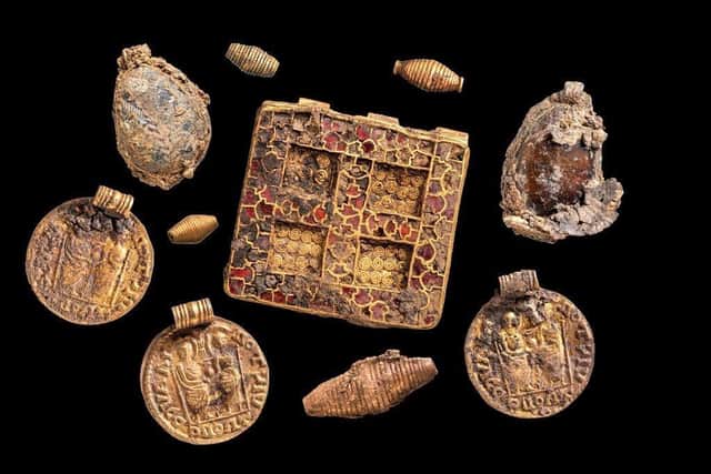 Collection of pendants from the necklace. The find is being dubbed the 'Harpole Treasure'