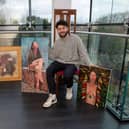 Billy Lockett pictured with some of his father’s artwork which will feature in the exhibition at 78 Derngate in March. Photo by David Jackson.