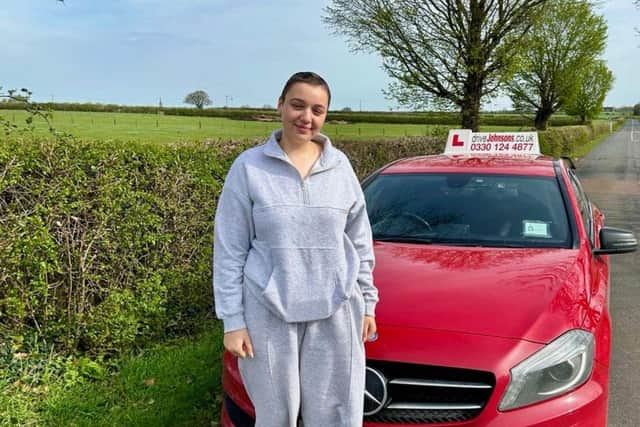 Danika on her first driving lesson with the Drive Against Cancer scheme