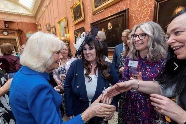 Fay Wickett and Maria Hutchinson from Serenity meeting Her Majesty The Queen