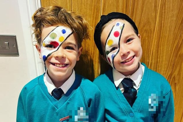 Harry and Olivia, aged 10 and eight off to school with very creative face paint.