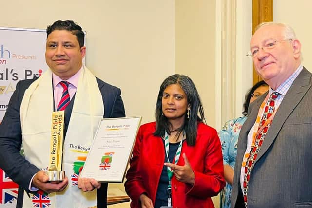 Naz Islam of Saffron collecting the Bengal's Pride award