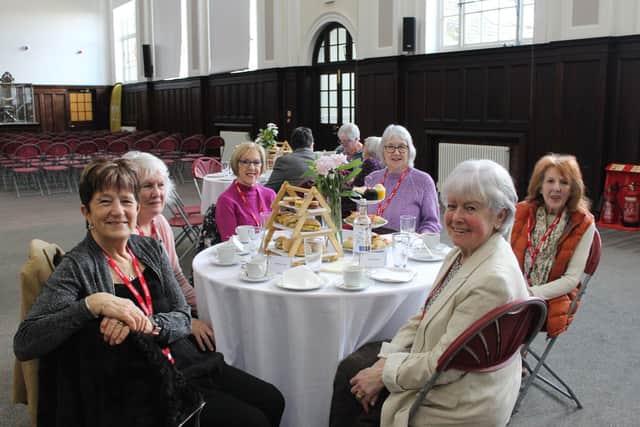 Former Northampton Girls' Grammar School students enjoying afternoon tea.