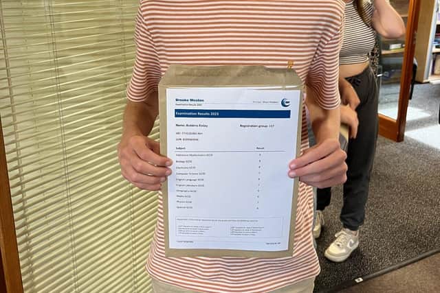 Finley celebrating excellent GCSE results at Brooke Weston Academy