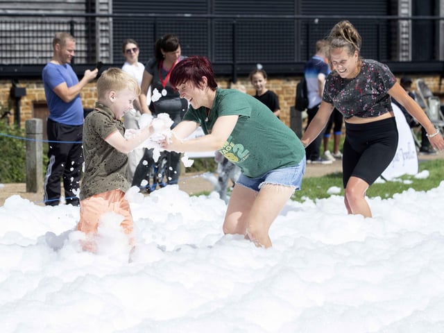 A family-friendly fun run, with water slides and obstacles, took place at Upton Country Park on Saturday (August 12) to raise funds for a Northampton charity.