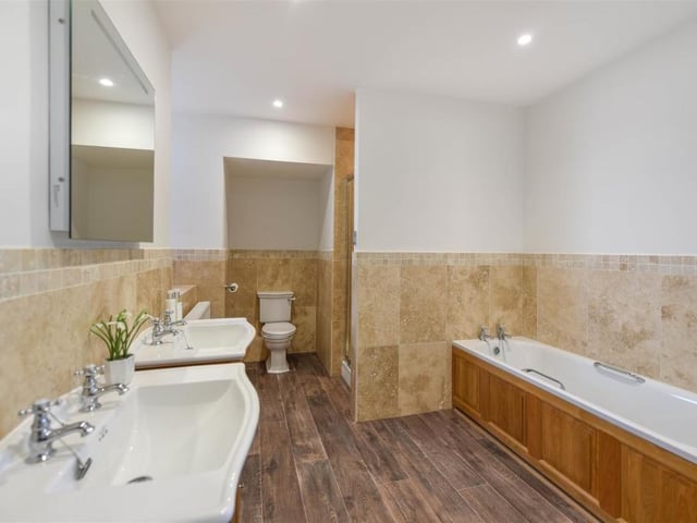 This seven bedroom home that is modern throughout, but maintains traditional features is on the market for a guide price of £2 million.