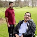 Patient Jovel (right) with Specialist Physiotherapist Binny said music gave him hope 