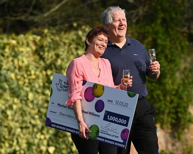 Marion Wood and Michael Williams celebrate winning £1 million on the Lotto