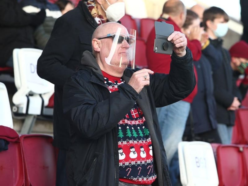 Northampton Town fans return to watch their team during the Sky Bet League One match between Northampton Town and Lincoln City at PTS Academy Stadium on December 19, 2020.
