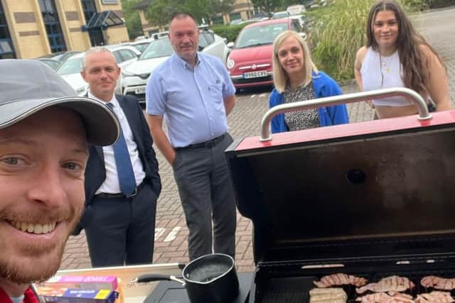 Dave Williams and the onefoursix marketing team taking part in the #Franklins50 challenge last year with a BBQ.