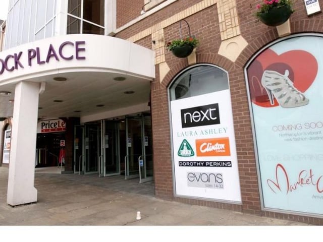 The old Peacock Place signage at the Market Square in 2010. Bottom right of the photo shows plans to convert the store into 'Market Walk'.